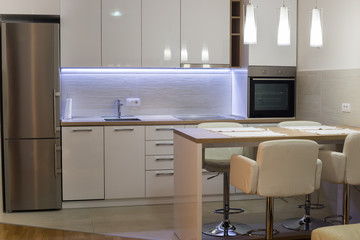 Modern interior of open-plan kitchen and living room