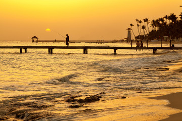 Fototapeta premium Caribbean sea beach sunset. Tropical beach in Caribbean sea, Dominican Republic.