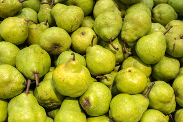 Group of green pears at a supermarket