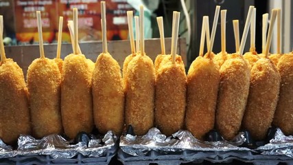 Korean battered fired hot dog, French fry encrusted corn dog
