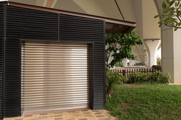 Steel sliding door, metal sheet texture of a shop