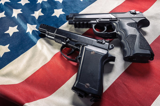 Handgun lying on American flag