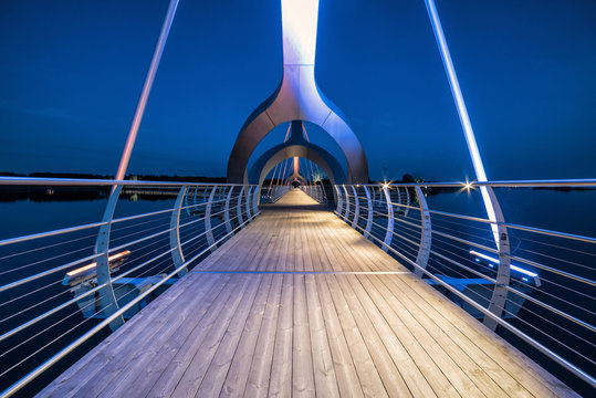 Fototapeta Solvesborg bridge perspective in evening lights