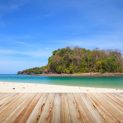 Fototapeta premium Wood table top on beach background.