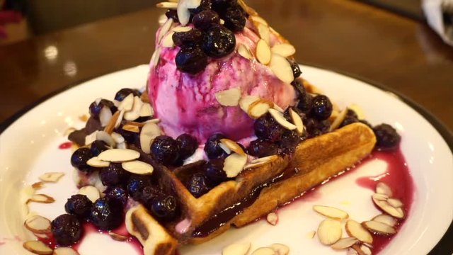 Close up ice cream blueberry waffle 