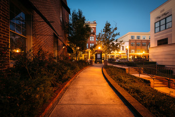 Walkway and buildings at night in downtown Rock Hill, South Caro