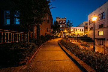 Walkway and buildings at night in downtown Rock Hill, South Caro