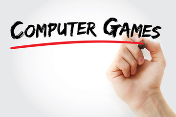 Hand writing computer games with marker, concept background