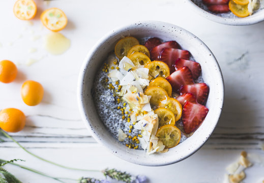 chia pudding breakfast bowls with kumquats, berries & lavender h