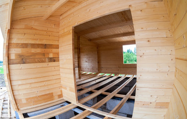 Construction of a new wooden house. Inside view