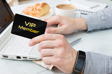 Man uses VIP member card on the internet