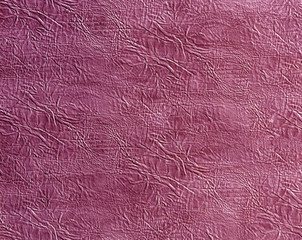 pink artificial leather surface.