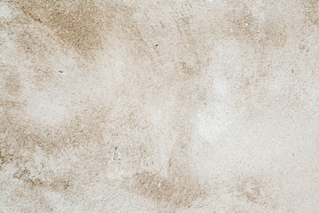 Bright and speckled wall texture background. Focus point in the center.