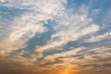 Sunset sky with white clouds and bright sky background.