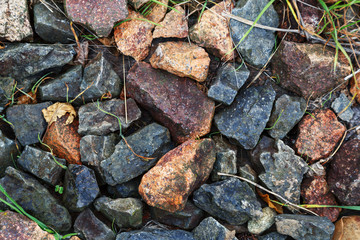 Texture of stone crushed stone. Background of gravel of gray color