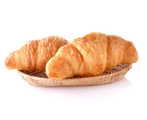 Fresh and tasty croissant isolated on white background. Closeup.