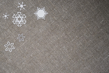Рождество текстура. Белые снежинки льняная ткань. Зима открытка - obrazy, fototapety, plakaty