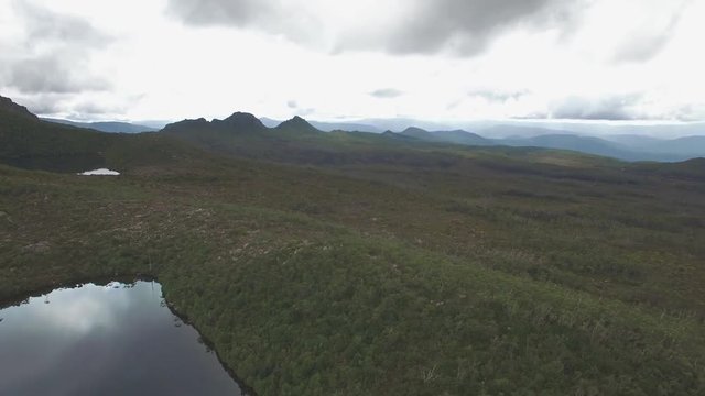 Round pan bove Lakes Osborne and Perry revealing high mountains at Hartz Mountains National Park, Tasmania, Australia
