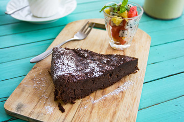 Chocolate cake with fruits salad