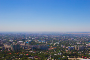 Fototapeta na wymiar Almaty city view from Koktobe hill, Kazakhstan