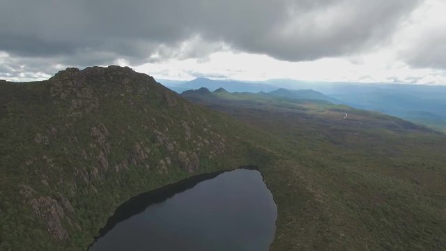 Backward flight over Lake Esperance at Hartz Mountains National Park, Tasmania, Australia