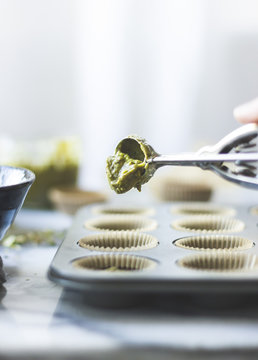 Salted chocolate pistachio butter cups. Ingredients placed in to