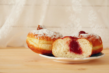 image of jewish holiday Hanukkah with donuts
