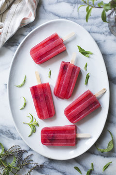 Raspberry lemon verbena popsicles.