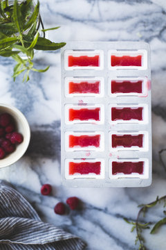 The recipe mixture for raspberry lemon verbena popsicles.