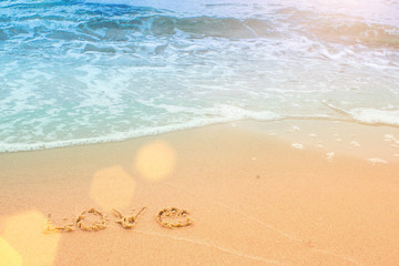 The inscription on the sand. Love.