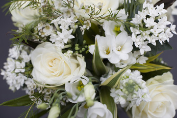 Arrangement of assorted fresh white flowers