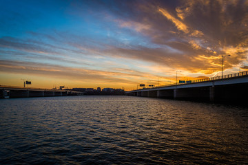 Sunset over the Potomac River and bridges in Washington, DC.