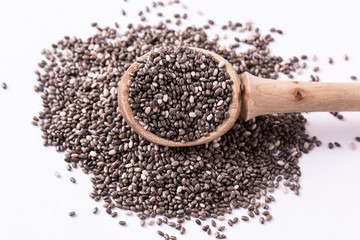 Chia seeds on wood background. Chia seeds protect heart,superfood. Healthy food