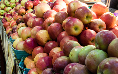 Fresh and juicy apples for sale on a country farm market