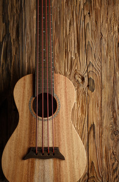 ukulele bass on aged wood