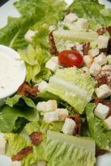  Caesar salad  croutons,  bacon, parmesan cheese and Caesar dres