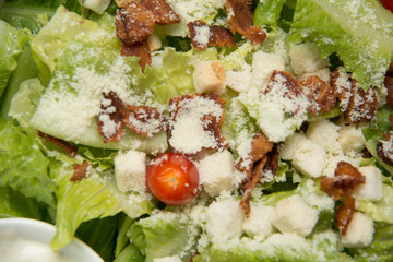  Caesar salad  croutons,  bacon, parmesan cheese and Caesar dres
