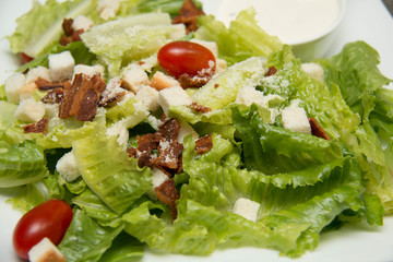  Caesar salad  croutons,  bacon, parmesan cheese and Caesar dres
