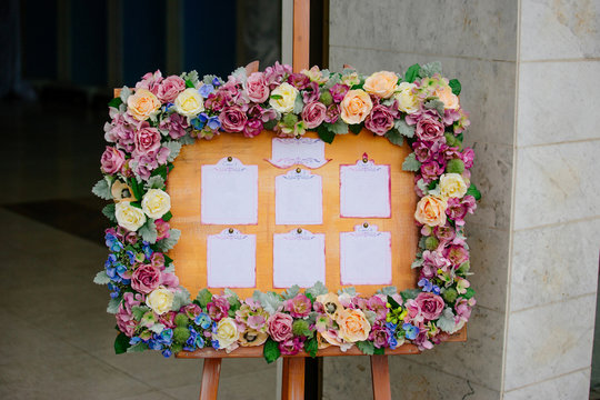 Floral frame with a list of wedding guests