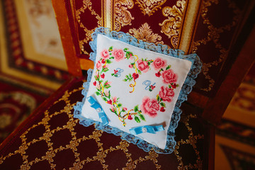 Pillow for wedding rings with handmade embroidery