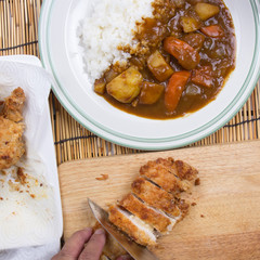 Chef slicing Tongkatsu for decorated Japanese pork curry