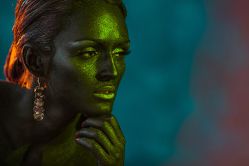 Bronze lady's thoughtful face held by her palm