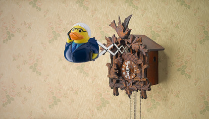 Salesman Rubber Duck coming out of cuckoo clock
