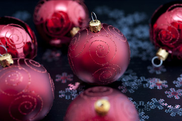 Red Christmas baubles with snowflake ornaments