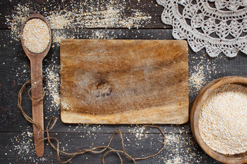 Oat bran in the wooden bowl