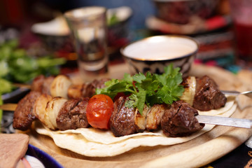 Kebab with meat and vegetables on skewers