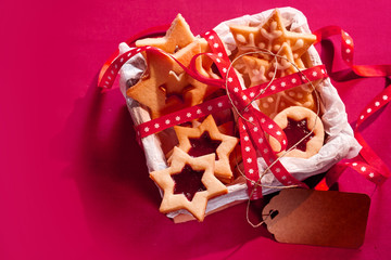 Square box with star shaped sugary biscuits