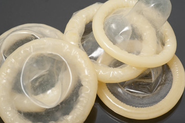 Pile of unused latex condoms