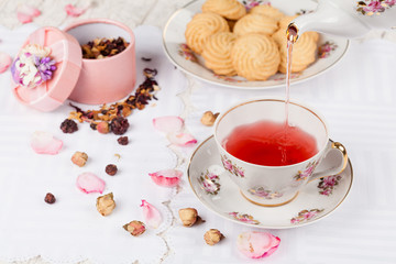 cup of red tea on serving table