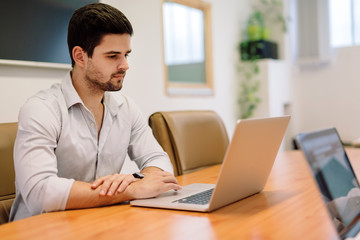 Businessman working on laptop